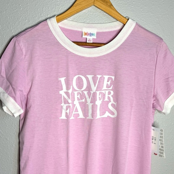NWT Small “LOVE NEVER FAILS” Liv T-shirt , LuLaRoe - Picture 2 of 4